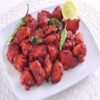 9. Chicken 65+Naan · Fried chicken tossed with green chilies, curry leaves and spices.
