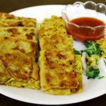 14. Mughlai Paratha · Fried patties stuffed with egg, chopped chicken and onion.