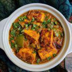 52. Paneer Tikka Masala · Cubes of cottage cheese cooked in tandoori oven finished in tomato based gravy & flavored wi...
