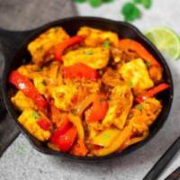 56. Paneer Jalfrazie · Cottage cheese sauteed with fresh green peppers, onions, green chilies & tomatoes.come with ...