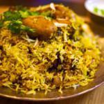 61. Chicken Dum Biryani · Chicken (with bone) cooked with basmati rice and spices.