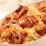 67. Chicken Tikka Biryani · Boneless chicken roasted in day oven, then cooked with basmati rice and spices.