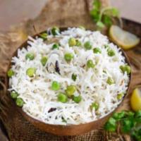 73. Pulao Rice · Basmati rice cooked with green peas.