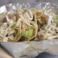 Supreme Taco · Steak, pico-de-gallo, lettuce, cheese, sour cream, with your choice of chicken, or beef in a...