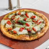 Pesto Pizza  · Fresh mozzarella, cherry tomatoes, pesto sauce.