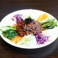 Spicy Noodle Salad · Buckwheat noodles with julienned vegetables and boiled egg spicy sauce.