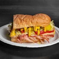 The Butcher Shoppe Sandwich · Rare roast beef, oven gold turkey, imported ham, golden salami, mortadella and Swiss cheese ...