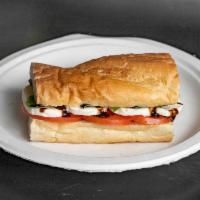 Caprese Sandwich · Tomatoes, fresh Buffalo mozzarella, fresh basil, salt, pepper and topped with balsamic vineg...
