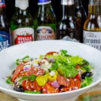 Italian Salad · Mixed greens, pepperoni, soppressata, olives, tomato, red onion, house cheese blend, peppero...