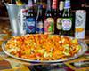 Nacho Mama Pizza · Ground beef, shredded lettuce, diced tomato, taco sauce, Mexican cheese blend and crumbled n...