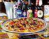 Cowboy Pizza · Pepperoni, meatball, mushroom, kalamata olives, oregano.