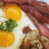 2 Eggs Plate · 2 Egg with your choice of bacon, ham sausage links/patties or corned beaehash. Choice of sid...