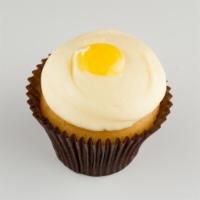 Lemon Drop Cupcake · Lemon filled vanilla cake, topped with lemon buttercream and a dollop of lemon garnish!