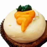 Carrot Cake Cupcake · Carrot Cake Made with shredded coconut and GA pecans and topped with Cream Cheese Frosting use