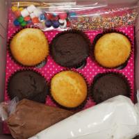 Cupcake Decorating Kit · Decorating kit comes with 3 chocolate and 3 vanilla cakes, 1 bag of vanilla buttercream and ...