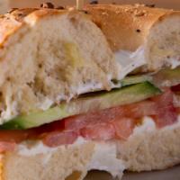 Everything but the Egg · Cream cheese, tomato and cucumber on an everything bagel