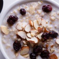 Steel Cut Oatmeal · Delicious organic steel cut oatmeal served with choice of milk and choice of topping: pecans...