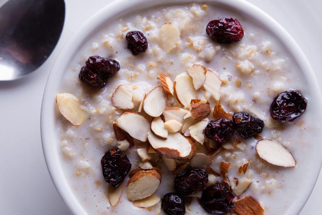 Steel Cut Oatmeal · Delicious organic steel cut oatmeal served with choice of milk and choice of topping: pecans, walnuts, almonds or raisins.