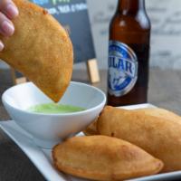 Shredded Beef Venezuelan Empanada · Cheese, meat, chicken, or pabellon.