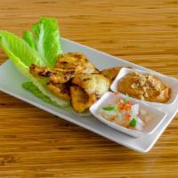 Chicken Satay · Marinated grilled chicken served with a peanut sauce and cucumber salad.