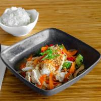 Garlic Stir Fry · Broccoli, carrot, red bell pepper, onion, and homemade savory garlic topped with crispy frie...