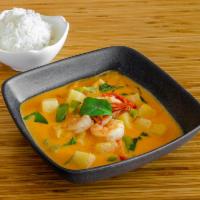 Pineapple Curry · Thai red curry paste with pineapple, bell pepper, basil, and coconut milk.