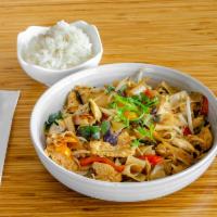 Drunken Noodle · Stir fried wide noodles with basil, red, bell pepper, onion, and bean sprouts in basil sauce.
