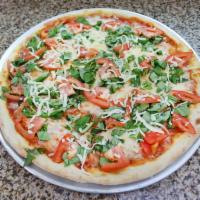 Margherita Pizza · Tomato sauce, Mozzarella cheese, fresh basil and sliced tomato.