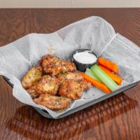 Chicken Wings · Tossed with Your Choice Of Sauce. Served with Ranch.