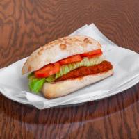 Chicken Buffalo Sandwich · Grilled Chicken Breast Tossed In Buffalo Sauce, Topped with Mozzarella Cheese and Served Wit...