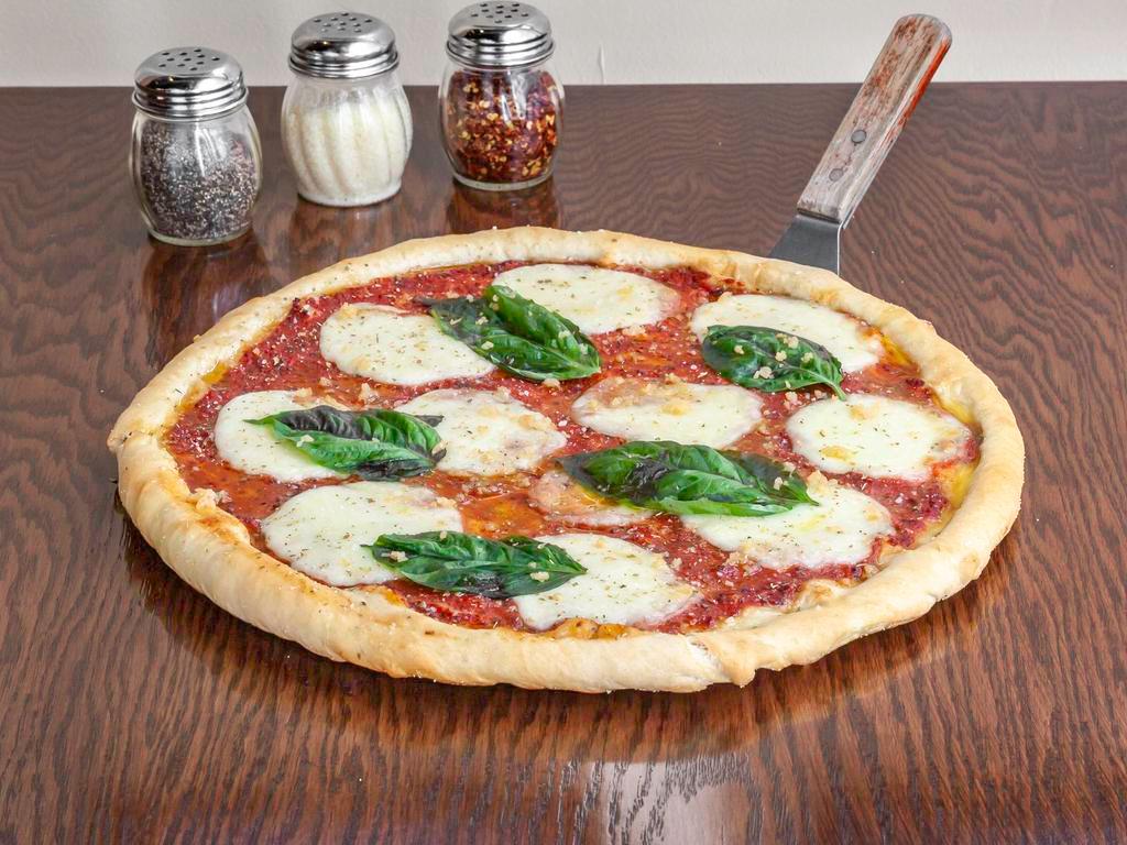 Margherita Pizza · Olive Oil, Fresh Garlic, Fresh Mozzarella, Fresh Basil.