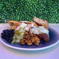 Cheese Plates · Three Cheese Varieties, Honeycomb, Raisins, Toasted Almonds, Pickled Fennel, Toasted French ...