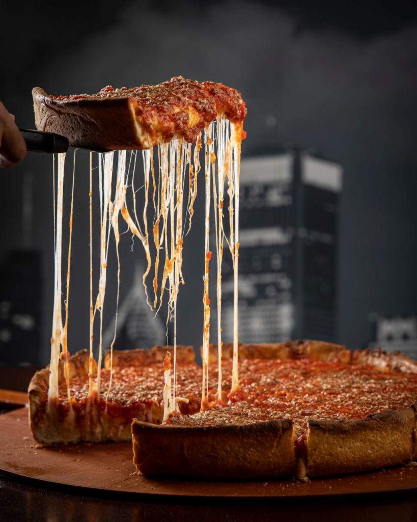 Chicago-Style Deep Dish Pizza · Chicago's famous deep dish is a buttery crust filled with mounds of mozzarella cheese and topped with Rosati's Chicago-style sauce.