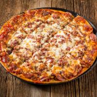Meat Mania Specialty Pizza · Gourmet Italian sausage, meatball, and pepperoni with bacon on top.