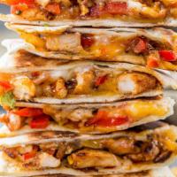 Quesadilla Charcoal Chicken · Served with tomatoes, onions, bell peppers and mix cheese with salad an sour cream .