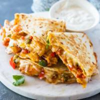 Quesadilla Shrimp · Served with tomatoes onions, mix cheese and Bell peppers with salad an sour cream.