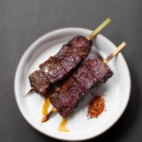 18 Hr Beef Short Rib with Tare Glaze · Boneless short rib, marinated, slow cooked then grilled over charcoal with tare glaze. This ...