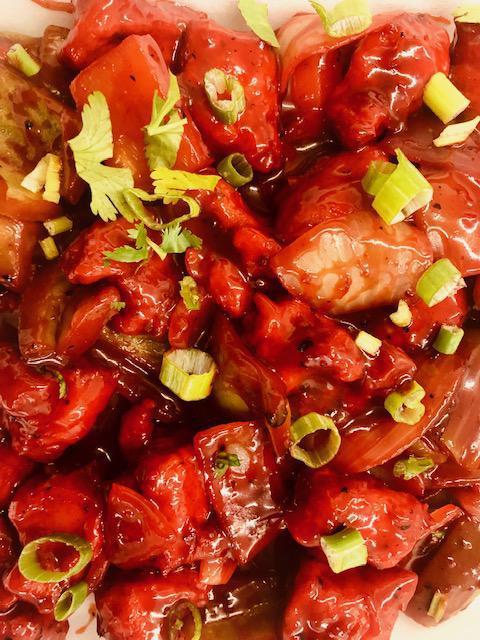 Orange Chicken Chili · Special spices mixed with red pepper, green pepper and onion. Served with rice.