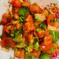 Paneer Chili · Special spices mixed with red pepper, green pepper and onion. Served with rice.