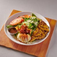The Baja Cobb Salad · Fresh greens, topped with marinated, grilled chicken breast, California avocado, hard-boiled...