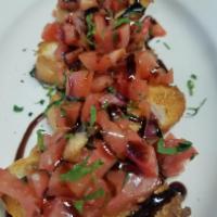 Bruschetta · Lightly toasted Italian bread topped with diced tomatoes, garlic and basil, tossed in olive ...