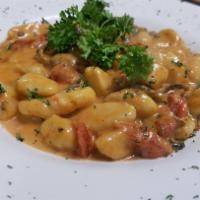 Gnocchi · Homemade in house!! With tomato
cream sauce and mushrooms
