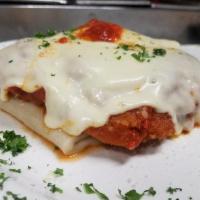 Chicken Parmesan with Pasta · Lightly breaded chicken breast topped with marinara sauce and mozzarella cheese and baked. S...
