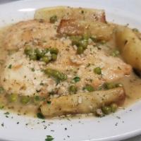 Chicken Vesuvio · Roasted boneless breast with potatoes,
peas, garlic and basil in white wine