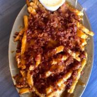 Bacon Cheese Fries · Bacon and melted Monterey Jack cheese on top of fries. Served with ranch dressing.
