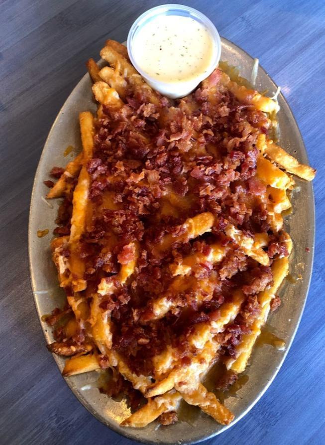 Bacon Cheese Fries · Bacon and melted Monterey Jack cheese on top of fries. Served with ranch dressing.