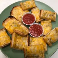 Garlic Cheesy Bites · Comes with Monterey Jack and cheddar cheese. Served with marinara.