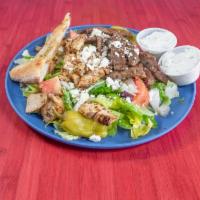 Zorba Salad · Grilled chicken and gyro meat. Served on lettuce, tomatoes, onions, feta cheese, cucumbers, ...