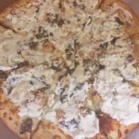Zorbas Gyro Delight Pizza · Gyro meat, chicken, onions, feta cheese with extra cheese, and tzatziki sauce on top. No piz...