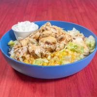 Yum Yum Chicken Bowl · White rice, lettuce, cilantro salsa, corn, yum yum sauce, sour cream, sesame seeds, and blac...
